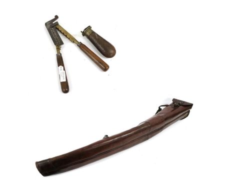 A Stitched Leather Shoulder Case for a Pair of Shotguns, the tops with satchel type flaps, rolled straps to hold the shoulder