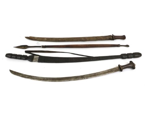 A Tuareg Type Sword, with diaper engraved steel blade, leather bound grip and scabbard; two Shotel Type Swords, each with a E