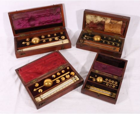 Four Sikes Hydrometer thermometer sets for proofing alcohol, each in fitted case.