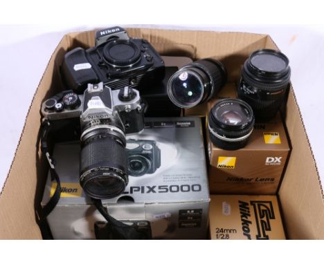 Nikon F90X camera, Nikon FM2 camera, Nikkon 1:3.5-4.5 lens, Hoya skylight 1B 1:4.5 lens, Nikkon 1:11.8 series E lens, Nikkor 