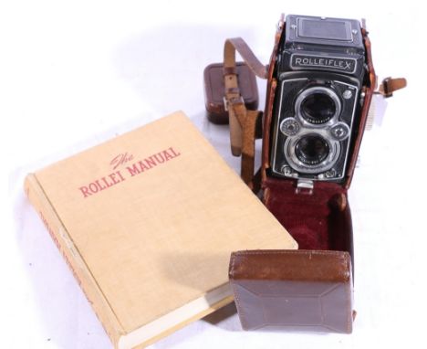 Rollieflex Frank & Heidecke twin lens camera with Carl Zeiss Tessar 1:3.5 f=75mm lens in leather case with a copy of the Roll