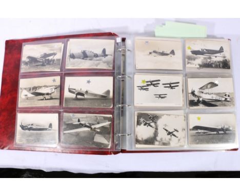 Album of approximately four hundred (400) postcards many of army interest, planes, boats etc.
