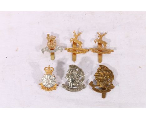 Two Huntingtonshire Battalion cap badges by J R Gaunt of Birmingham, Two Artists Rifle badges, Yorkshire Regiment gilt metal 