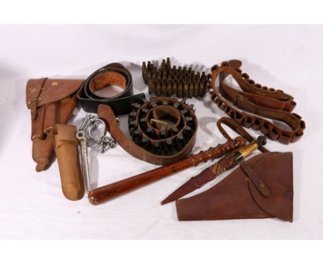 Pair of Hiatts handcuffs, a Police officers truncheon, a Sudan type dagger, two leather holsters, two cartridge belts etc.