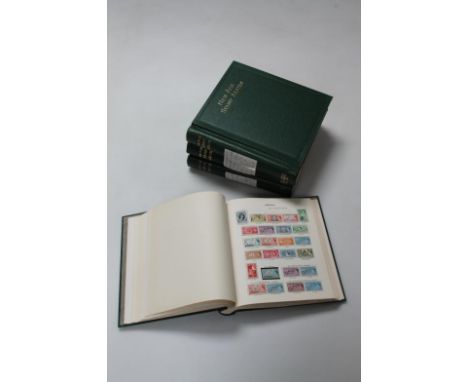 Commonwealth, Queen Elizabeth II 1953-67, four volume Stanley Gibbon New Age stamp album, 95% full with extra loose leaves an