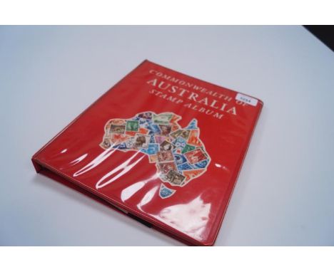 A Stanley Gibbons Commonwealth of Australia Stamp Album, containing George V and later used stamps, incomplete.