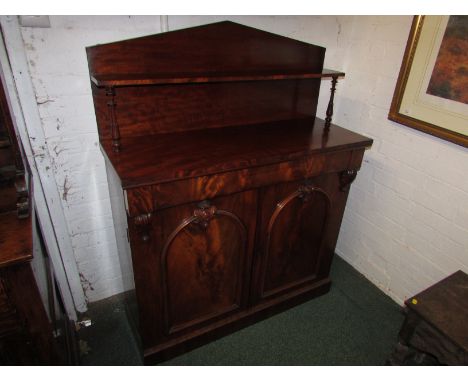 Victorian mahogany chiffonier, perhaps circa 1840, with single drawer over two cupboard doors and arched mouldings, the apex 