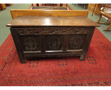 18th century oak three panel coffer, the front carved with three foliate lozenges and carved frieze, the lid with more recent
