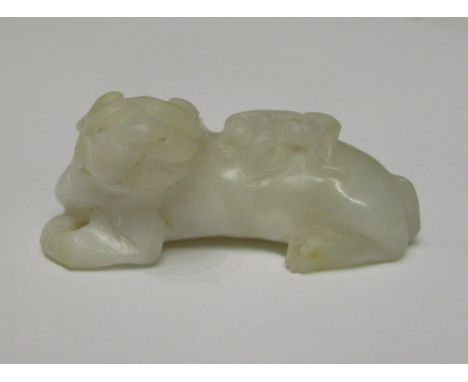 Chinese mutton fat jade figure of a recumbent dog, length 5.5cm
