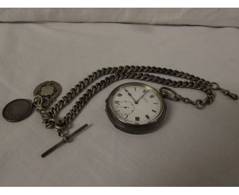 White metal open face pocket watch, white enamel dial signed H Samuel Manchester, Roman chapter with subsidiary seconds dial 