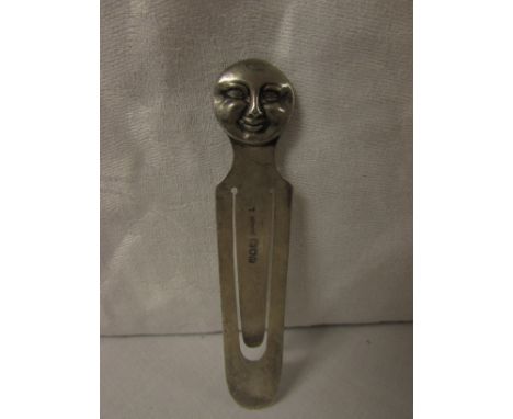 Silver book mark with moon face terminal, marks for London, 1900, maker's stamp Sampson Mordan & Co, length 8.3cm, 0.2ozt