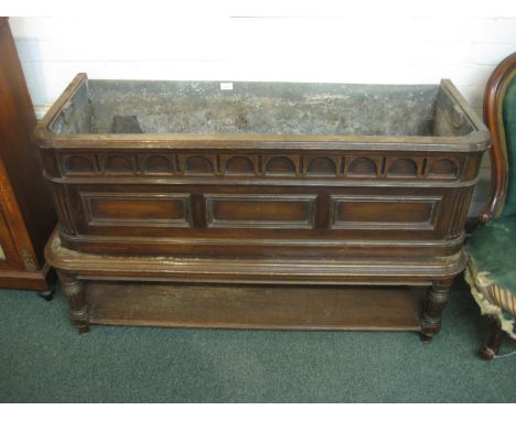 A large Victorian zinc lined mahogany flower trough / wine cooler, with architectural moulding to the front and a lower shelf