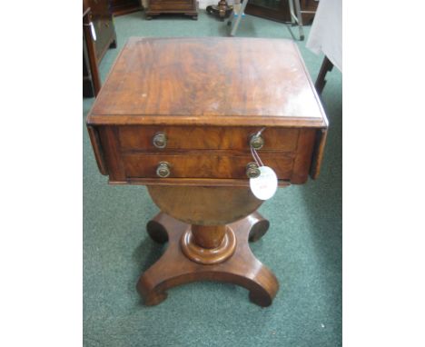 A William IV mahogany lady's work table c1840, two drawers, sliding and removable work box under, standing on pear-shaped col