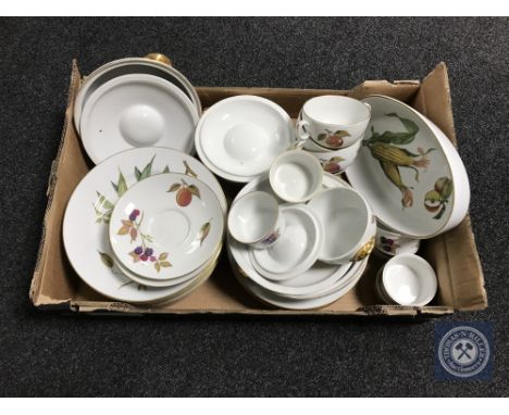 A box of thirty-one pieces of Royal Worcester Evesham dinner ware, oven dishes and ramekins 