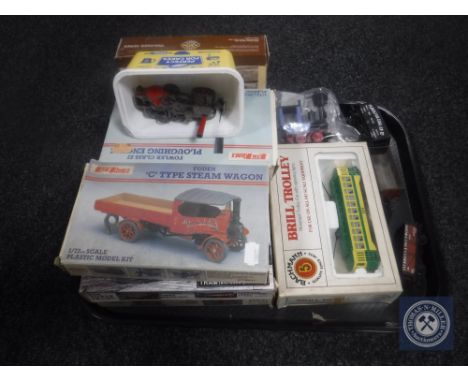 A tray of plastic modelling kits, steam wagon, tram, ploughing engine, together with a boxed Bachman Brill trolley, whistle e