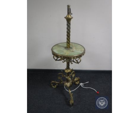 A brass and onyx rise and fall standard lamp/wine table 