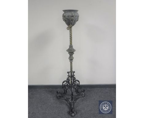 A Victorian cast iron and brass rise and fall standard oil lamp base  CONDITION REPORT: 124cm high and 45cm wide at the base.