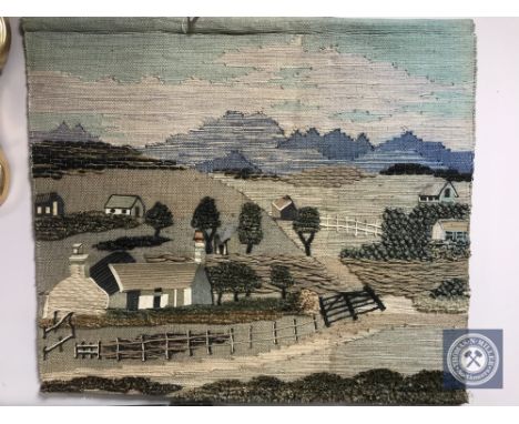 A woollen tapestry wall hanging depicting a rural scene 
