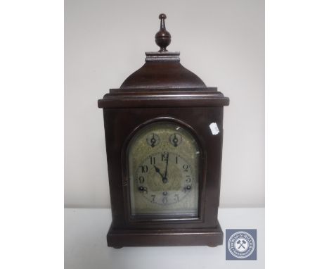A German bracket clock on bun feet 