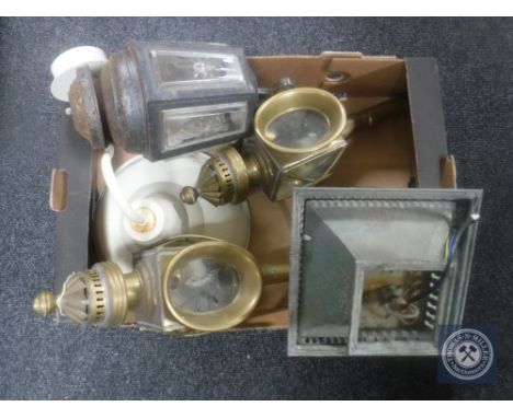 A box of pair of late 19th century brass lamps, copper carriage lamp and two further lamps