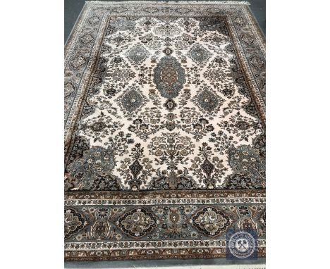 A machine made Indian style carpet, 250 cm x 355 cm 