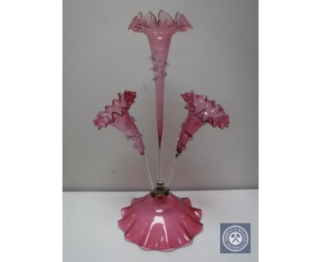 A Victorian three way ruby glass epergne  CONDITION REPORT: Chip to rim of one section. 