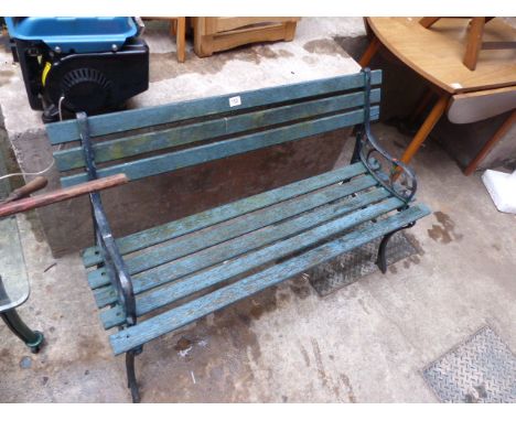 Garden bench with wrought iron ends