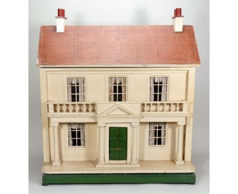 A Lines Bro wooden two storey dolls house, English circa 1910, with painted yellow exterior to ground floor and paper brick e