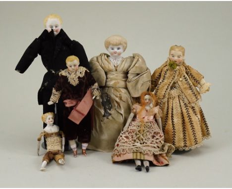 Six miniature Parian-type shoulder head dolls, German circa 1870, all with finely painted features, including lady with mould