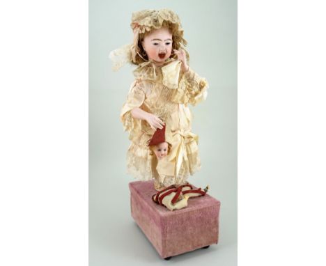 Rare Lambert automata of ‘Little girl with broken doll’, French circa 1890, the finely moulded 211 pale bisque Jumeau head, h