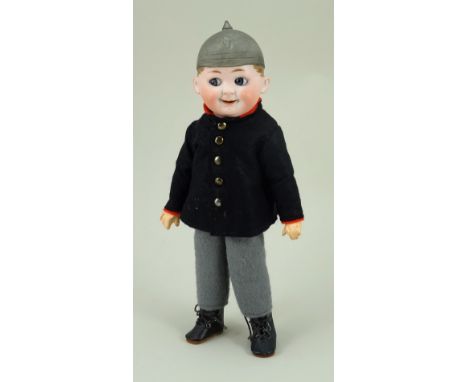 Rare Max Handwerck bisque headed soldier doll with moulded helmet, German circa 1915, with blue glass ‘side-glancing’ eyes, o