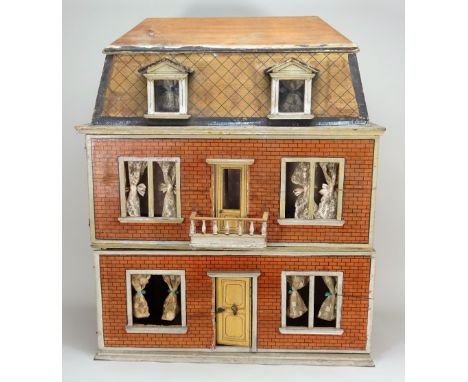 A good Christian Hacker three story dolls house, German circa 1880, the elegant villa with paper red brick effect exterior an