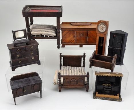 Collection of wooden dolls house furniture including Elgin of Enfield, 1910-1930, including Elgin sideboard and shaving mirro