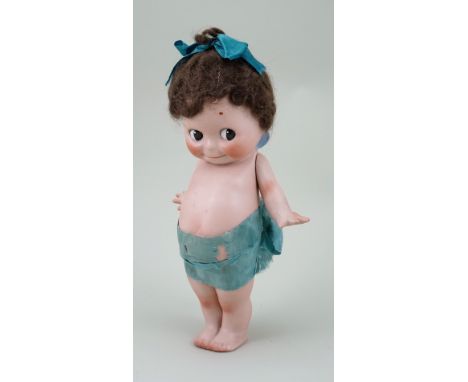 Large Rose O’neill all-bisque ‘Kewpie’ doll, German circa 1918, with painted brown ‘side-glancing’ eyes, painted smiling mout