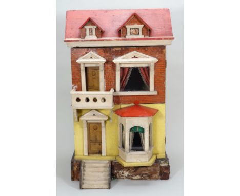 A painted wooden and paper lithographed dolls house, English circa 1900, the painted cream and paper red brick effect exterio