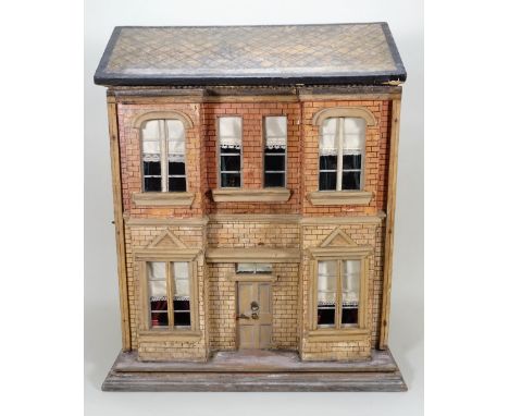 A Christian Hacker two storey dolls house and contents model 357, German circa 1900, with paper lithographed brick effect fro