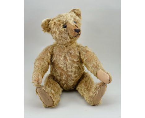 Early light brown mohair centre seam Steiff Teddy Bear, German circa 1909, straw filled bear with black boot button eyes, bla