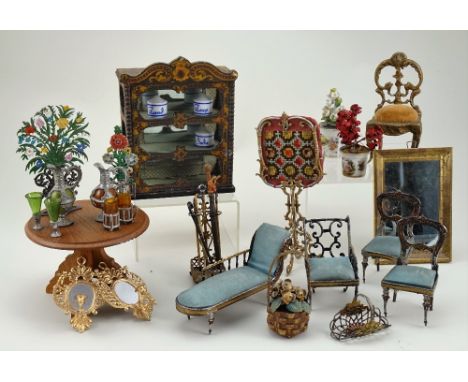 A good collection of miniature dolls house furniture and accessories, mostly German 1890s, including painted wooden shelves w