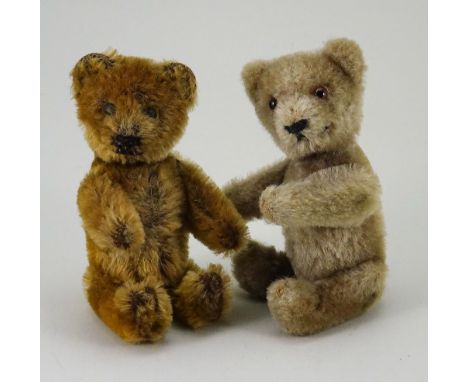 Two Schuco miniature mohair Teddy bears, 1930s/50s, golden Perfume bottle bear with black boot button eyes, stitched nose and