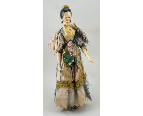 A fine and large painted wooden Grodner Tal doll and child, German circa 1820, with painted features, rouged cheeks and paint