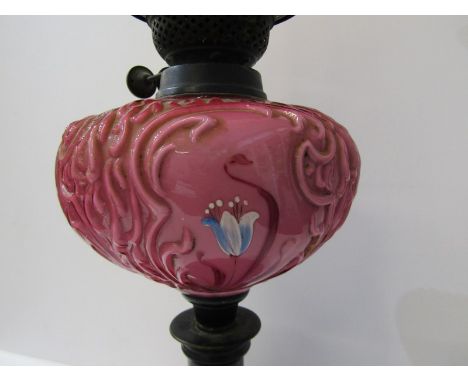 VICTORIAN OIL LAMP with red opaque glass reservoir with a etched floral shade 24" overall