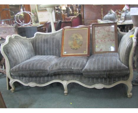 FRENCH STYLE SETTEE, a painted and carved triple seater settee with splayed arms and scroll feet with matching armchair 