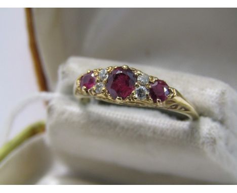 18ct YELLOW GOLD RUBY &amp; DIAMOND OAK STYLE RING, principal oval cut ruby approx 0.5ct set between 2 pairs of old brilliant