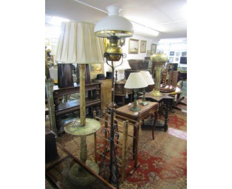 OIL LAMP, Edwardian wrought iron oil lamp with adjustable stand and milk glass shade 