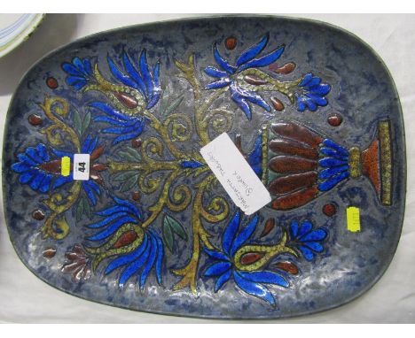 QUIMPER, a signed art pottery enamelled plaque by Marjatta Taburet decorated with stylised vase of flowers 7" high 