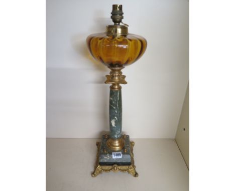 A marble ormolu mounted oil lamp converted with and electric fitting - Height 52cm - some chipping to base