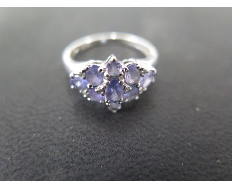 A 9ct white gold nine stone dress ring - size N - Weight approx. 2.8gms Condition report: Usage wear