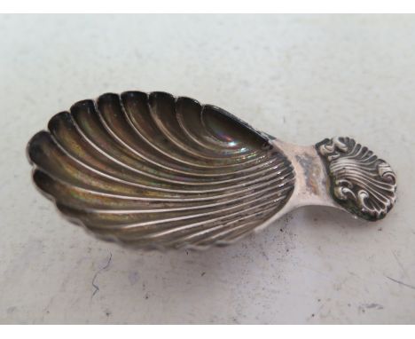 A silver hallmarked caddy spoon of scallop form, marked for Birmingham 1969-70Condition report: In good clean condition but w