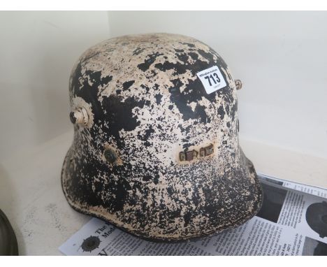 A rare Irish Army steel helmet model 1927 Vickers Helmet painted white 1939 for civil defence use