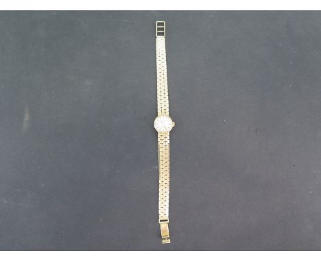 A 9ct yellow gold cased Rotary ladies watch with 9ct yellow gold bracelet strap - total weight approx 25.6 grams